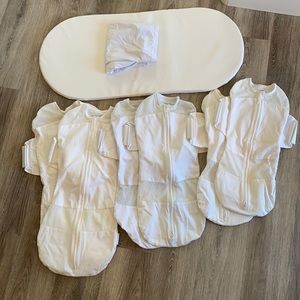 SNOO swaddles and extra mattress pad